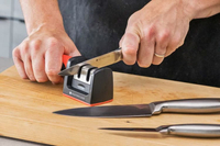 //irrorwxhopolln5m.ldycdn.com/cloud/lrBpjKlilqSRjljpklnjkq/How-to-Use-Knife-Sharpener-in-Knife-Block3.jpg