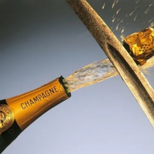 how to open champagne with a knife